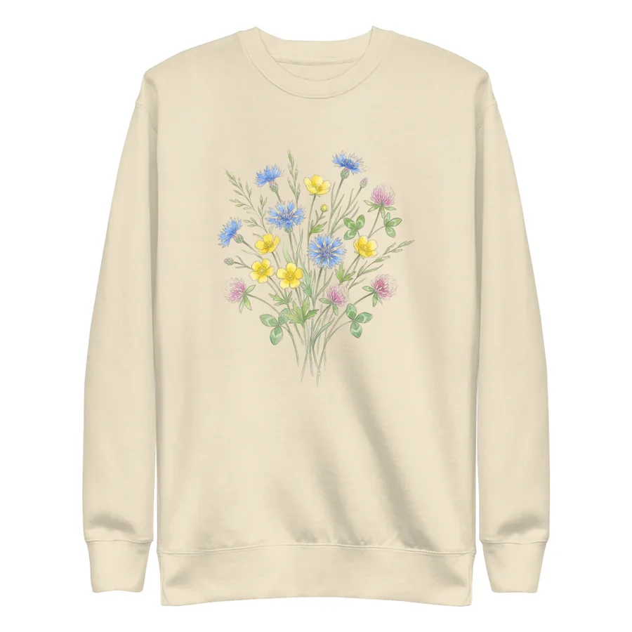Off-white sweater with a bouquet of wildflowers in watercolour