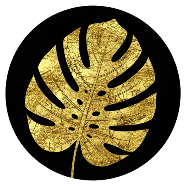 monstera leaf in gold leaf on black